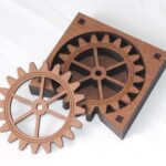 Laser-cut MDF gear coaster set with matching holder