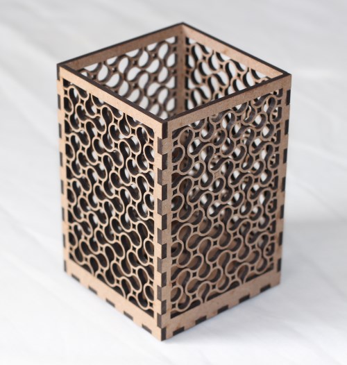 Tall laser-cut T-light holder with infinity pattern Infinity pattern T-light candle holder