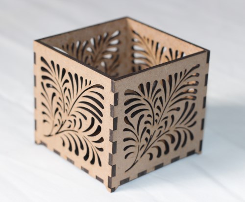 Small T-light holder with leaf pattern A1 Small laser-cut MDF T-light holder with leaf pattern