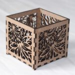 Small T-light holder with floral pattern